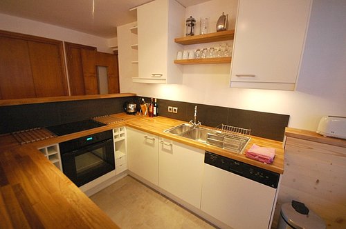 Kitchen with door onto balcony