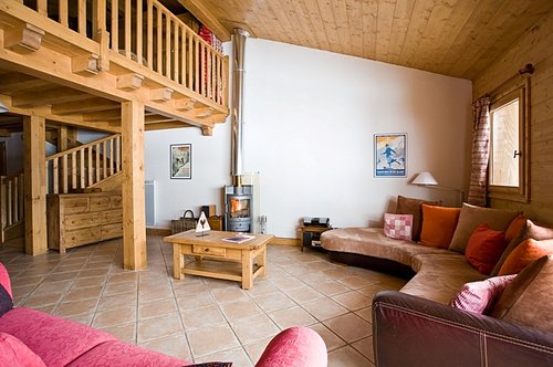 Open plan living area with mezzanine above