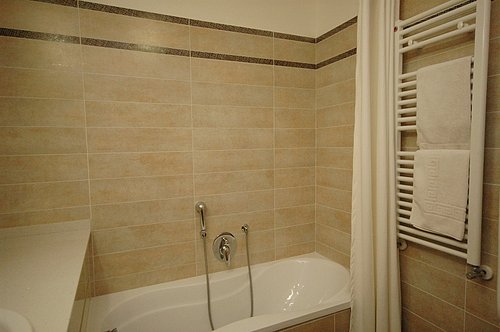 Bathroom with shower over