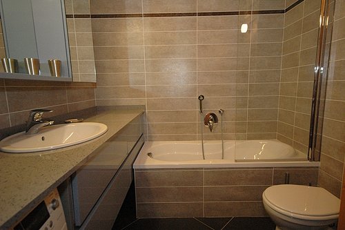 Bathroom with shower above