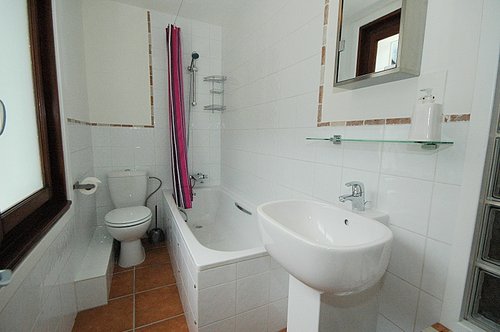Ensuite bathroom with shower above bath