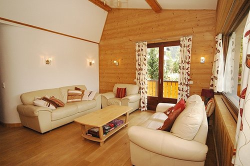 Living area with glass doors onto balcony
