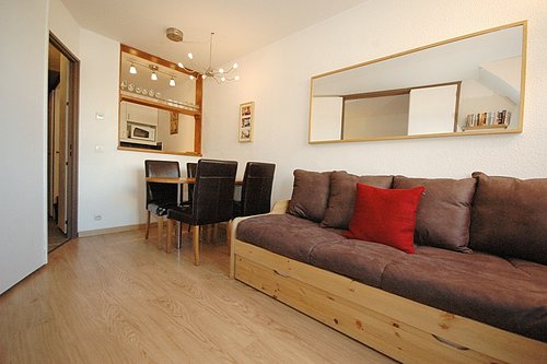 Kitchen behind living area