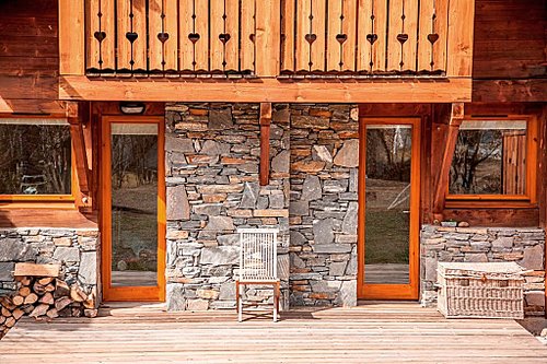 Glass doors lead to the deck and garden