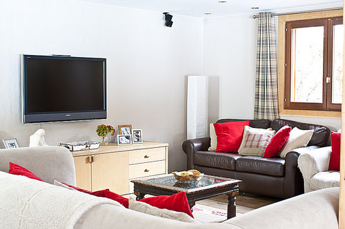Comfortable lounge area with oak floors