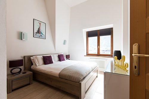The double bed in the apartment