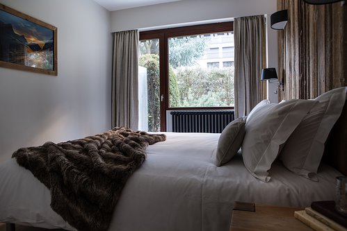 Bedroom 1 with door on to terrace