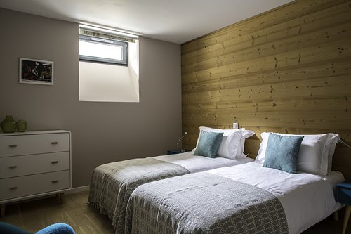 A twin bedroom in the apartment