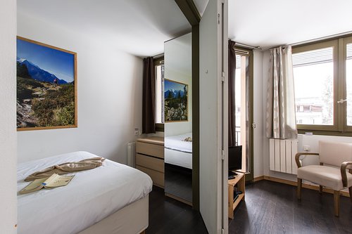 Folding doors to bedroom