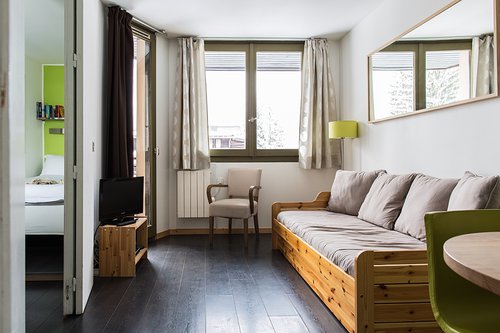 Living area with door onto balcony