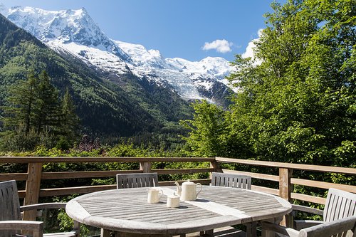 Outdoor dining furniture on the wrap around balcony