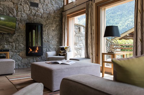 Comfortable sitting area with log fireplace