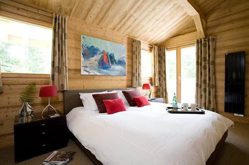 Double bedroom on the lower floor leading onto the lower deck