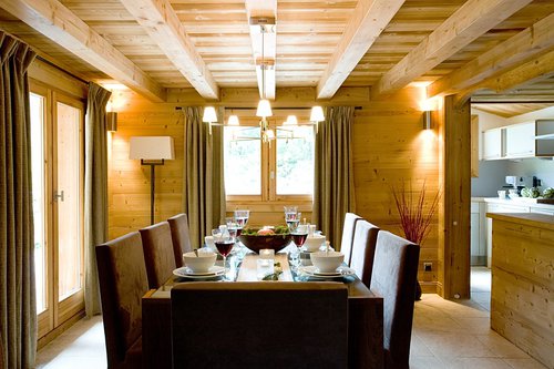Dining area with kitchen to the right