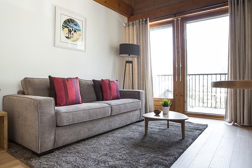Living area with doors onto balconies