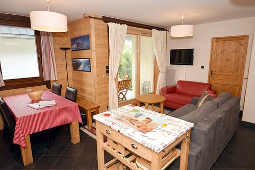Open plan living area with balcony