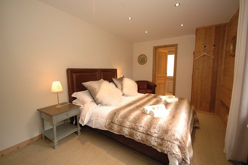 A double bedroom in the chalet with en-suite bathroom