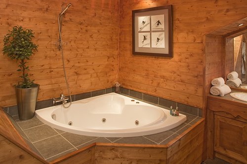 Master bedroom's ensuite with corner bath