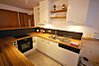 Kitchen with door onto balcony