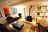 Open plan living area with log burner