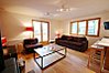 Open plan living area with log burner & sofabed (2 singles)