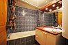 Bathroom with shower above bath