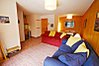 Open plan living area with dining for 4