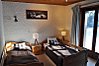 1 of 2 twin bedrooms opening onto terrace