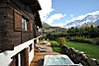 Terrace with hot tub opening onto garden