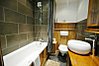 Bathroom with shower above bath
