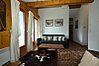 Living area with doors onto balcony